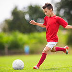 Kid Playing Soccer